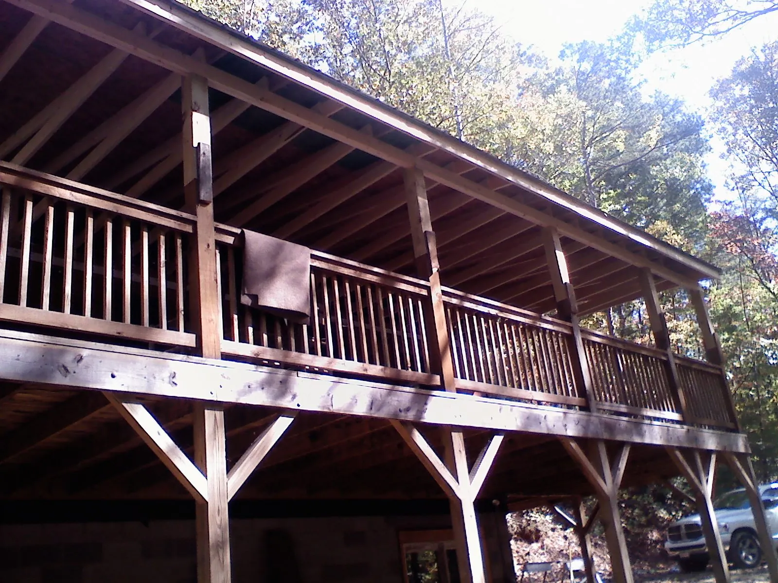Timber framing under a new elevated porch and deck — Roof Leak Repair in Strongstown by Roofing Brothers